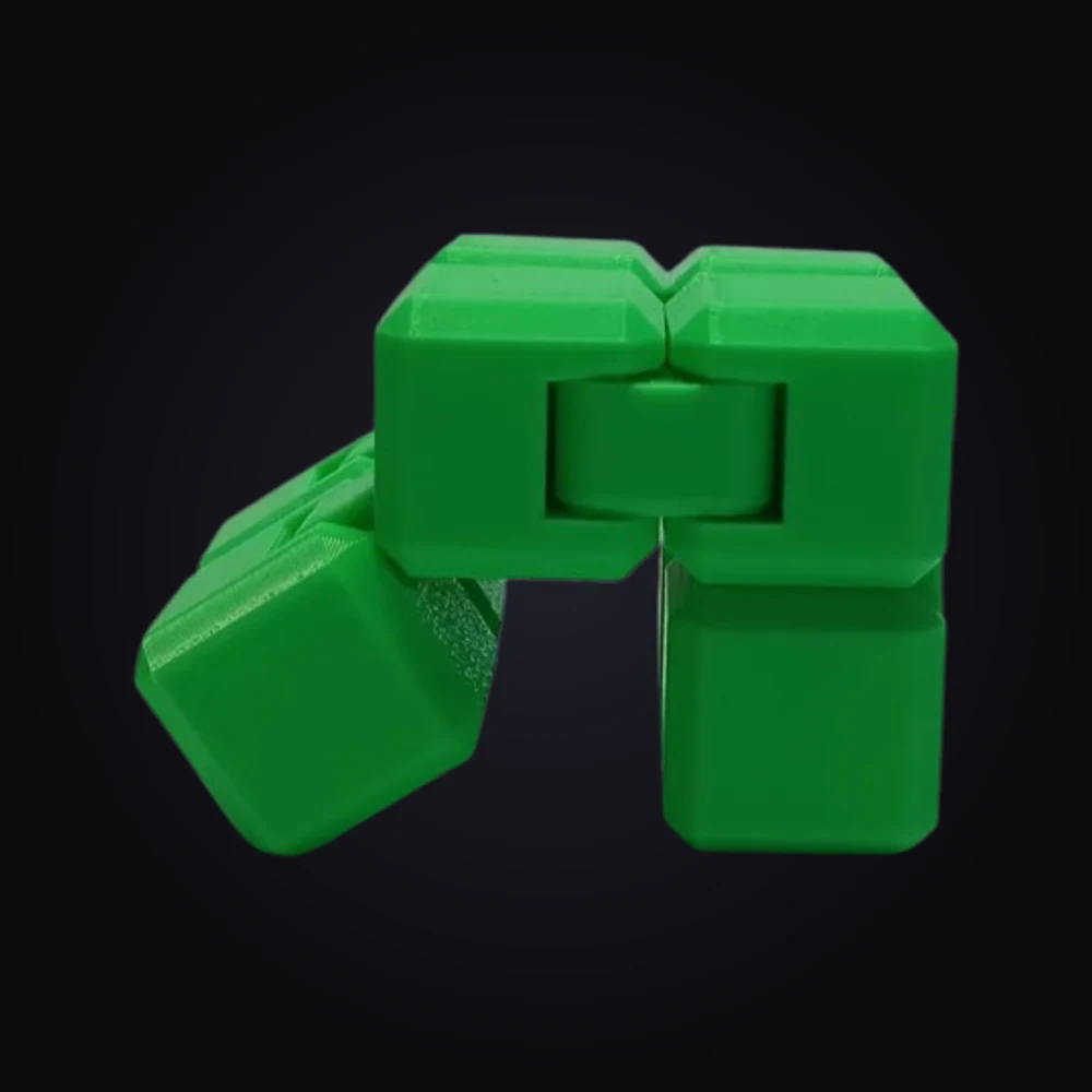 Grön infinity-kub fidget